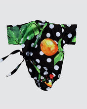 Load image into Gallery viewer, Baby kimono onesie black with white dots and leaves and fruits 
